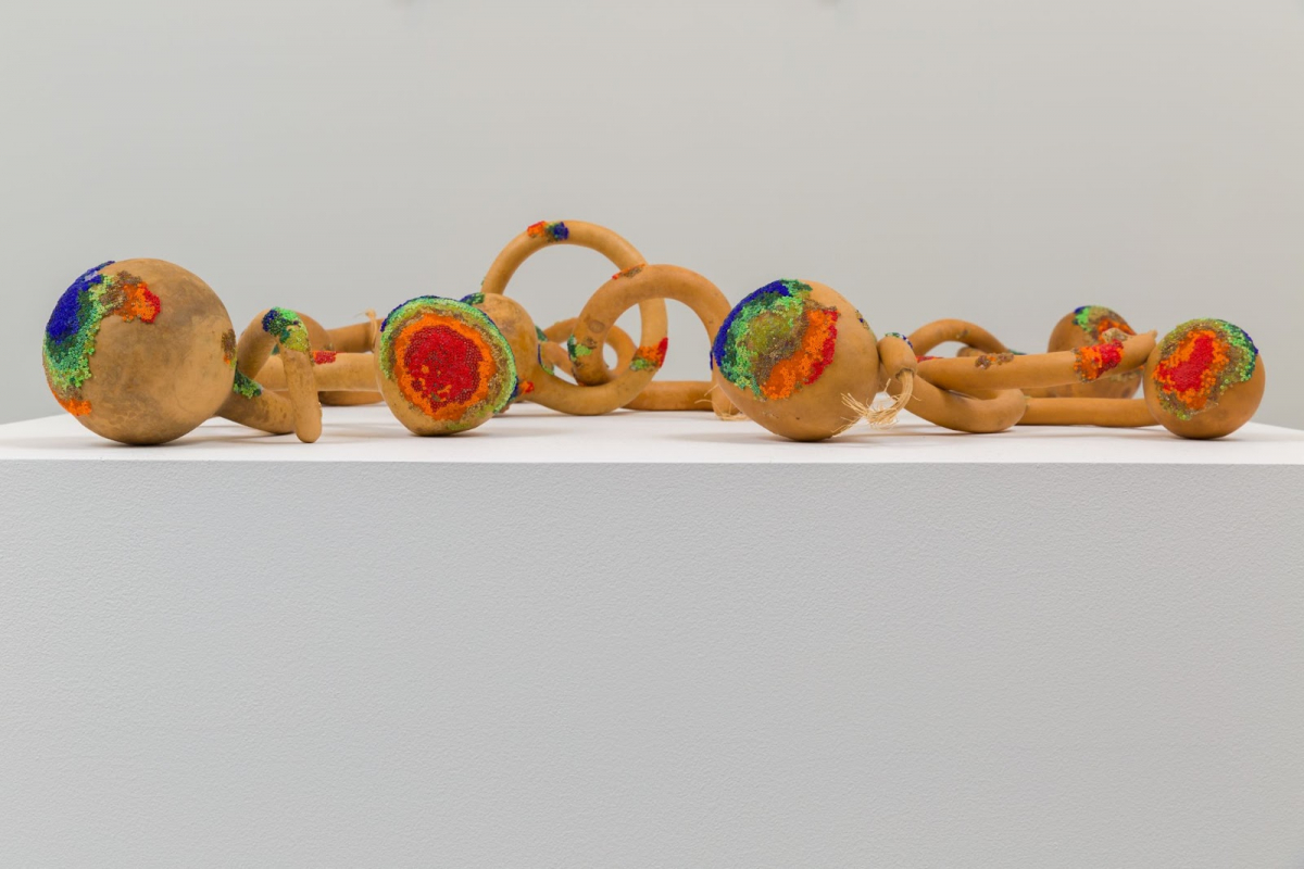 Sarah Rosalena, CMB RGB, 2021; Glass beads, gourds, pine sap, beeswax, Cosmic Microwave Background visualization. Courtesy the artist. Photo by Ian Byers-Gamber.